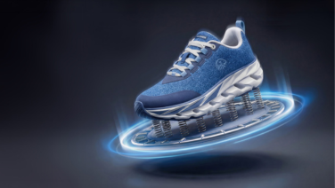 A cut-out blue Giesswein Wool Dream trainer with a white sole, surrounded by a bright blue ring of light and springs against a dark background.